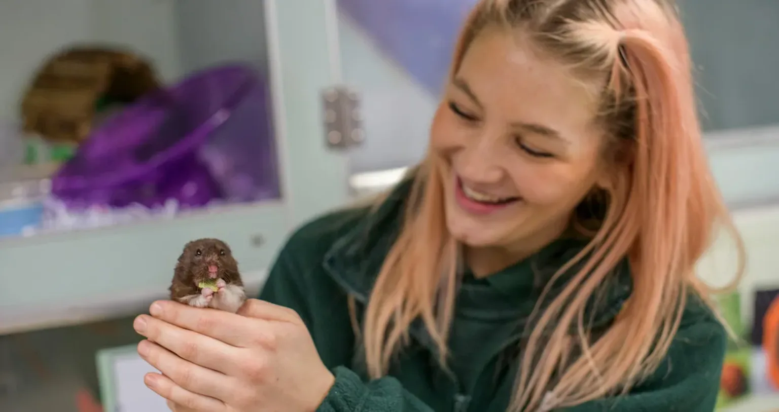 Staff member with a bird