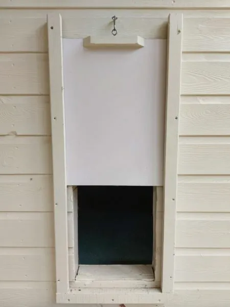 Pop hole between shed and run for poultry