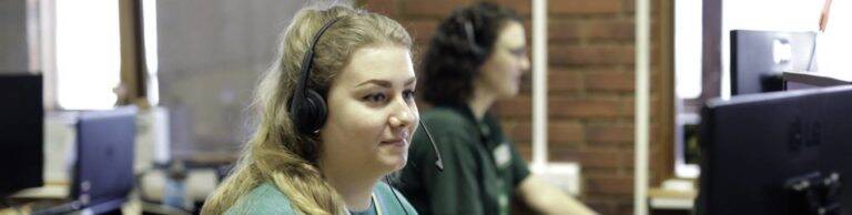 Woodgreen staff in the call centre helping customers over the phone