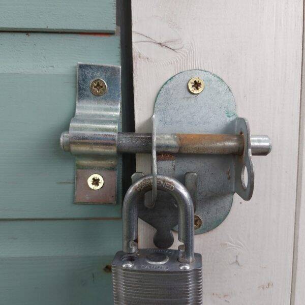 A padlock on a shed for rabbits