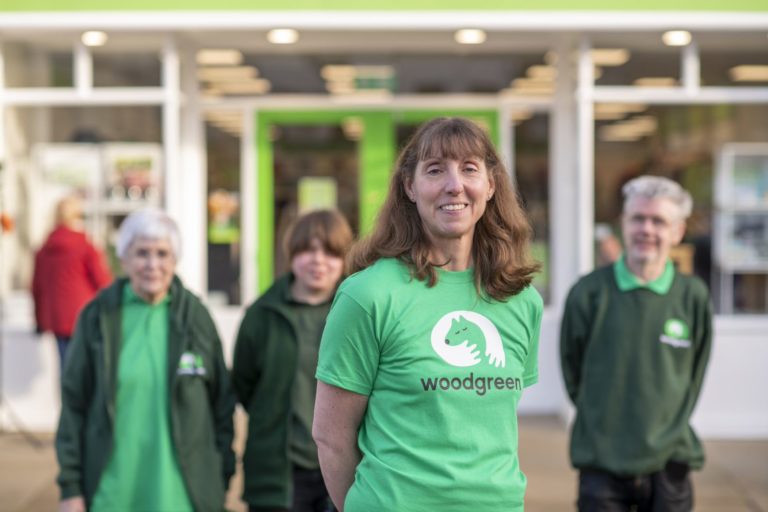 Woodgreen volunteers outside charity shop
